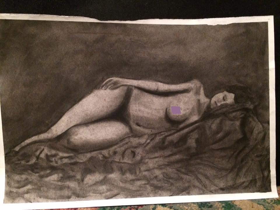 Nude woman on&nbsp;blankets