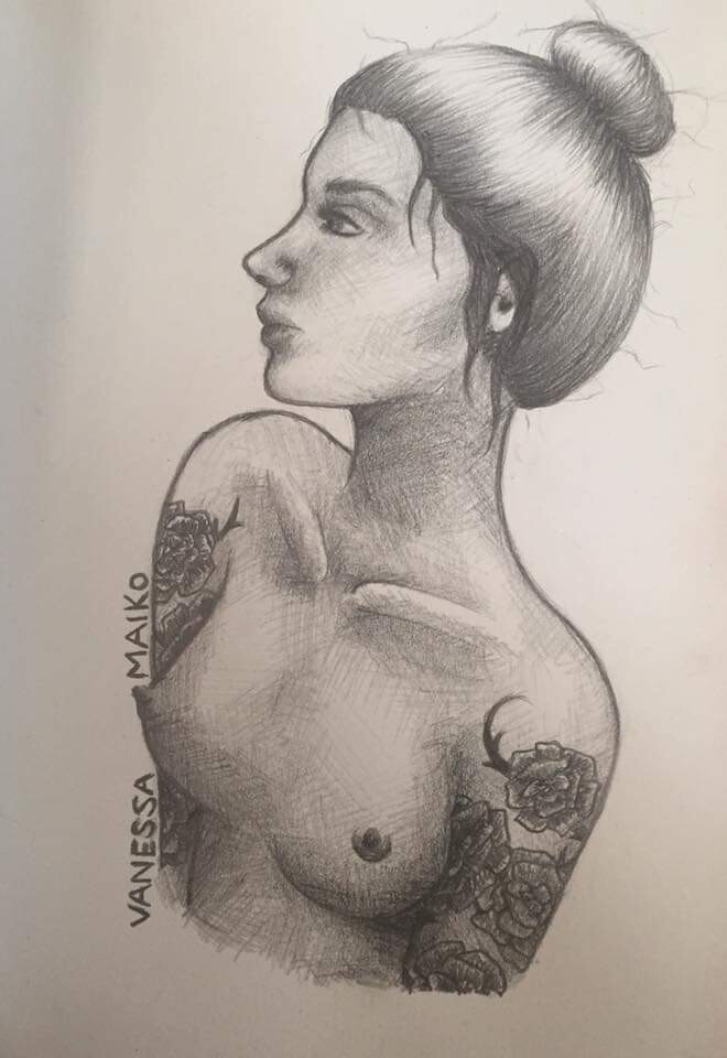 Nude woman with&nbsp;tattoos